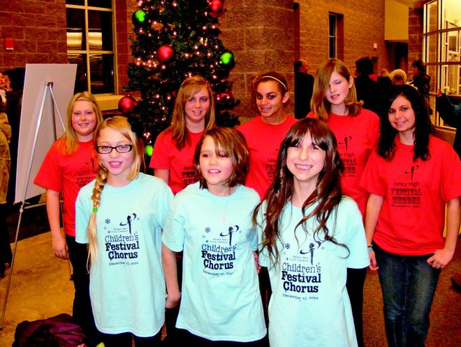 Submitted
Members of the United Junior High School choir (back from left) Kaitlin Grace, Andrea Wooters, MyKelti Mann, Kaylyn Hall and Emily Forget; (front) Olivia Roden, Chloe Stewart and Presslie Gillen, performed in Peoria Friday.