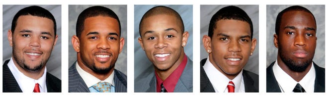 In this undated photo provided courtesy of OhioStateBuckeyes.com, Ohio State football players, from left, Mike Adams, Daniel Herrion, DeVier Posey, Tyrelle Pryor and Solomon Thomas are shown. All five were suspended by the NCAA on Thursday, Dec. 23, 2010, for the first five games of next season for selling championship rings, jerseys and awards and receving improper benefits. All can still play in the Sugar Bowl against Arkansas. (AP Photo/OhioStateBuckeyes.com) ** NO SALES, EDITORIAL USE ONLY **