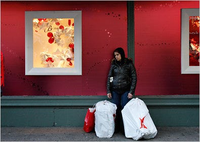 Early figures show this holiday shopping season is the healthiest since 2006. A weary shopper at Macy’s in Herald Square in Manhattan on Wednesday.