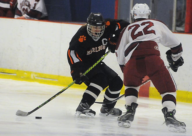 Marlborough's Hayden Voss attempts to get past Westborough's David Johnson during last week's game in the Borough's Cup.
