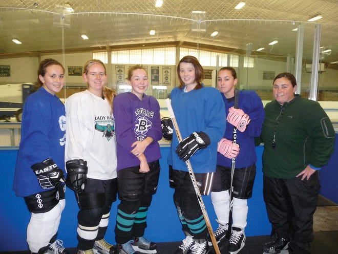 Bourne players on the newly formed Bourne-Mashpee-Wareham girls hockey team are, from left, Brandi Massi, Alex Goward, Natalia Gordon, Taylor Donovan, Nicole Anthony and coach Kristyn Alexander.