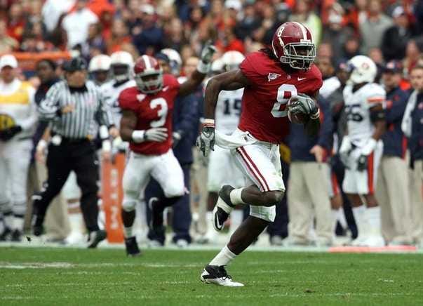 Alabama wide receiver Julio Jones (8) moves the ball downfield for a 68-yard touchdown during the first quarter of the Iron Bowl loss against Auburn.