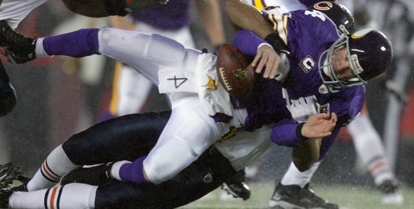 Vikings quarterback Brett Favre was taken down, and ultimately out - again, by the Bears this past Monday night.
