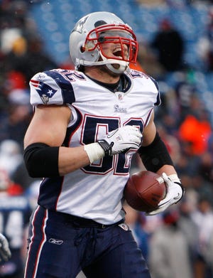 Patriots linebacker Dane Fletcher reacts after intercepting a pass during the second half of the Pats' 34-3 victory on Sunday in Orchard Park, N.Y.