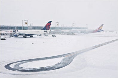 At Kennedy and the other two major airports in the New York area, more than 1,400 flights were canceled on Sunday. Amtrak canceled trains between New York and Boston.