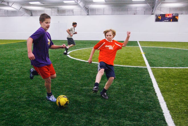 Nick Shaff controls the ball against Dylan Satterly at Goals Indoor Sports. Ted Schurter/The State Journal-Register