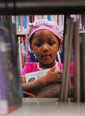 March 28: Another Rincon library photo that is one of my favorites. Pictured is Amanda Brown of Springfield. (DeAnn Komanecky/Effingham Now)