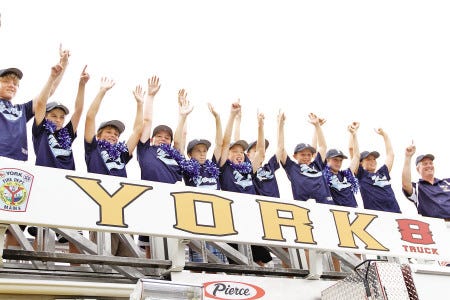 Rich Beauchesne file photo/rbeauchesne@seacoastonline.com
The York Little League state championship 11-year old All-Star team poses for photographs atop York’s Truck 8 after a homecoming parade.