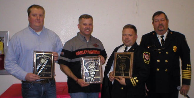 Dave Williams Career Firefighter of the Year (left), Chuck Altvater Volunteer Firefighter of the Year, Cpt. Andy Burriss Chief's Award and Fire Chief Vernon Rushing.Courtesy of Joe Forlenza