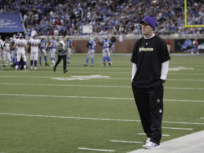 Minnesota Vikings quarterback Brett Favre watches from the sidelines in the fourth quarter of their NFL football game against the Detroit Lions Sunday in Detroit. The Lions won 20-13.