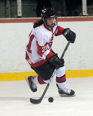 Sophomore Sarah Schwenzfeier scored the first goal for Hingham against Arlington Catholic Monday, Jan. 3, 2011.