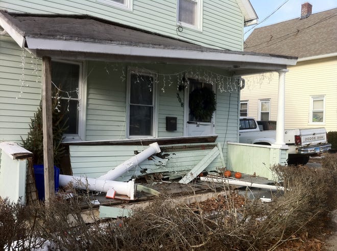 Car hits home on Boswell Avenue.