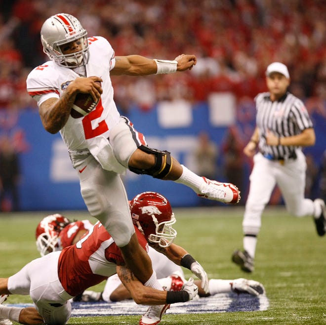 Ohio State quarterback Terrelle Pryor (2) makes a long gain to set up the team's first touchdown against Arkansas in the first half of the Sugar Bowl on Tuesday in New Orleans.