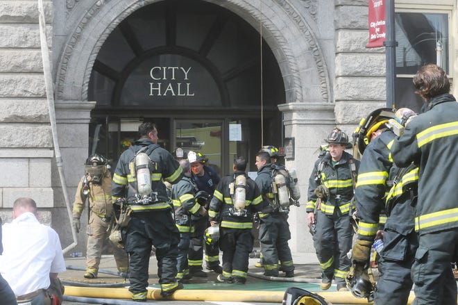 Firefighters at the Aug. 17 City Hall fire.