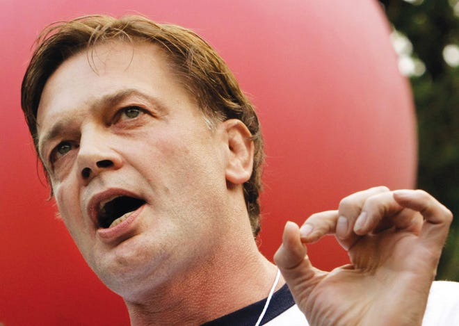 FILE - In this May 26 file photo, Dr. Andrew Wakefield addresses a gathering hosted by the American Rally For Personal Rights in Chicago's Grant Park. A 1998 paper by Wakefield, which was the first study to link a childhood vaccine to autism, was based on doctored information about the children involved, according to a new report on the widely discredited research. The conclusions of the 1998 paper have been renounced by 10 of its 13 authors and was later retracted by the medical journal Lancet, where it was published.