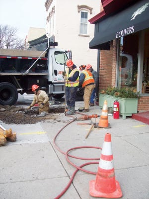 NYSEG workers repair a gas leak on South Main Street in Canandaigua.