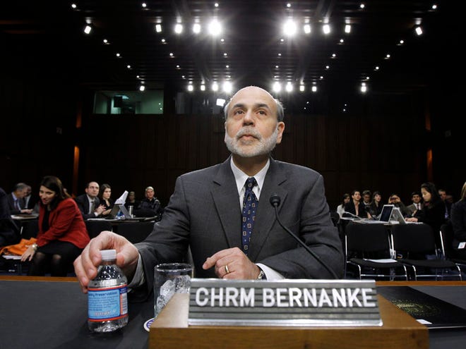 Federal Reserve Chairman Ben Bernanke takes his seat on Capitol Hill in Washington Friday, Jan. 7, 2011, prior to testifying before the Senate Budget Committee. (AP)