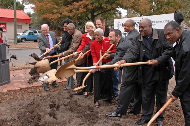 Savannah City Council members and other dignitaries break ground on the MLK Jr. Streetscape Phase II Implementation project at the intersection of MLK Jr. Blvd. and Exchange St. (John Carrington/Savannah Morning News)