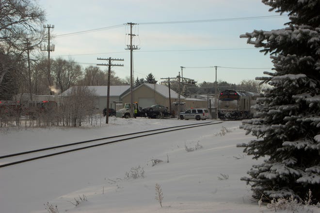 A 17-year-old Holland man escaped injury by about three or feet Saturday morning after failing to yield to an Amtrak train at a railroad crossing.