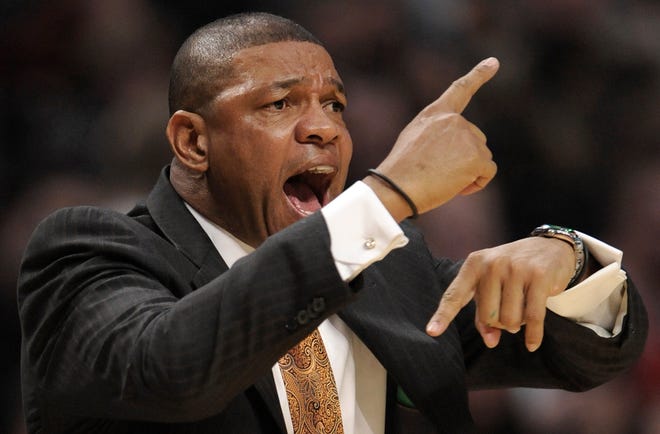 Celtics head coach Doc Rivers yells to his players in the first quarter.