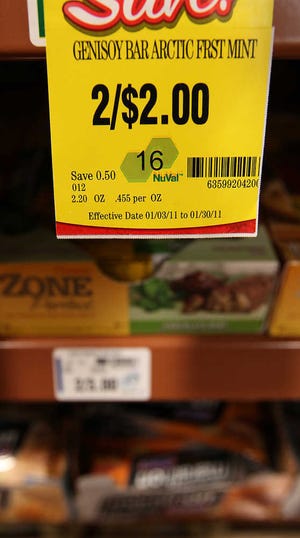 United stores are among supermarket chains in the United State that are including NuVal Nutritional Scoring System numbers on price tags. The numbers, which can be seen in green, let consumers know how healthy an item is for them. (Zach Long/Lubbock Avalanche-Journal)