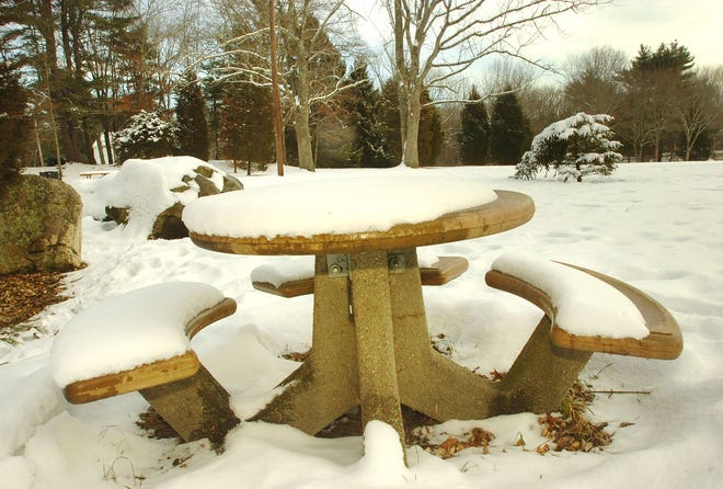 Snow covers a picnic table at Luddam’s Ford Park in Hanover on Sunday, Jan. 9, 2011.
