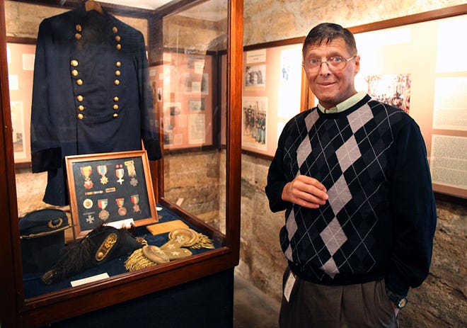 Gregory Moore, command historian at the Florida National Guard, stands in the St. Francis Barracks Museum on Friday afternoon. By DARON DEAN, daron.dean@staugustine.com