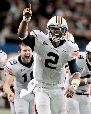 Auburn quarterback Cameron Newton and Oregon will face off in tonight's BCS national title game. The Associated Press photos