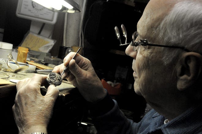 1/12 NE - James Peghiny, owner of the Clock and Watch Shop on Commonwealth Avenue in Auburndale, works on a Waltham watch on Thursday, January 6.

Keith E. Jacobson/CNC Staff Photographer