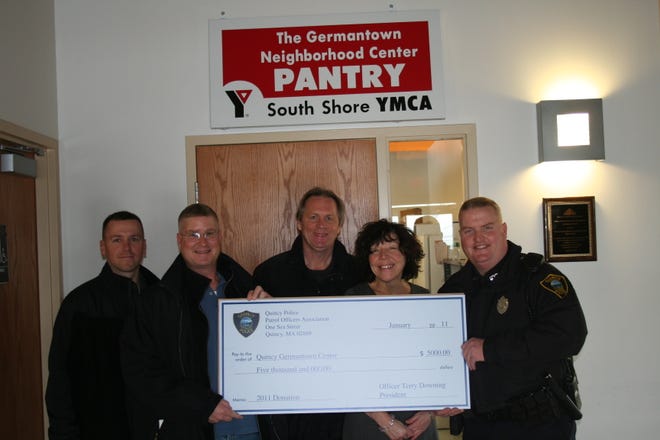 Officer William Mitchell, Officer Mark Folan-Treasurer, Michael Quinn, Kathy Quigley, Executive Director of the Germantown Neighborhood Center, Terrence Downing- President of the Quincy Police Patrol Officers Association.

The Quincy Police presented the Quincy Germantown Center with a check for $5,000.