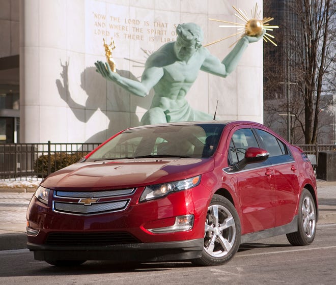 The new Chevrolet Volt is displayed at the North American International Auto Show in Detroit. A panel of automotive journalists picked the plug-in electric as the Car of the Year for 2011.