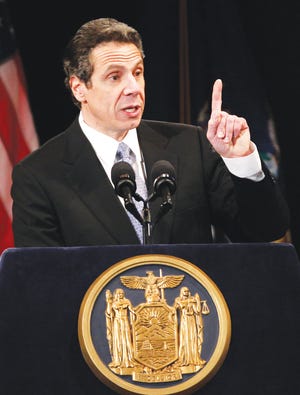 New York Gov. Andrew Cuomo delivers his first State of the State address at the Empire State Plaza Convention Center in Albany, N.Y., Wednesday, Jan. 5. Gov. Cuomo is 'shocked’ by the raises for 28 top NY troopers.