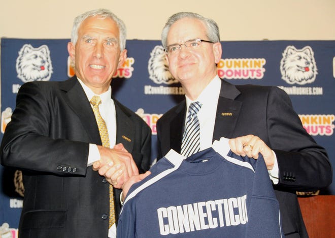 Dieu To/Norwich Bulletin
Paul Pasqualoni, left, UConn's new football coach, is expected to diversify the Huskies' offense among other changes next season.