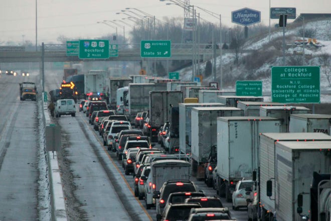 Traffic backs up in the eastbound lanes of Interstate 90 Saturday, Jan. 15, 2011, after a two-vehicle crash in Rockford. No injuries were reported.
