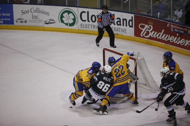 Michigan State applies pressure on the Lake Superior State net during Friday night's CCHA game. The Spartans won 4-0 Friday, while LSSU rebounded to win win a shootout, after a 2-2 tie Saturday night.