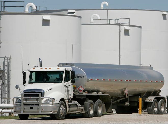 A tanker leaves the Tall Corn Ethanol plant after loading up with ethanolin 2006, file photo in Coon Rapids, Iowa. An Illinois biofuels company said Thursday it wants to build an ethanol fuel production plant in Greene County that would create hundreds of jobs.