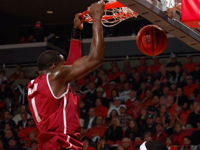 Alabama's JaMychal Green dunks the ball against Auburn in the first half Saturday. Green finished with 15 points for the Crimson Tide.
