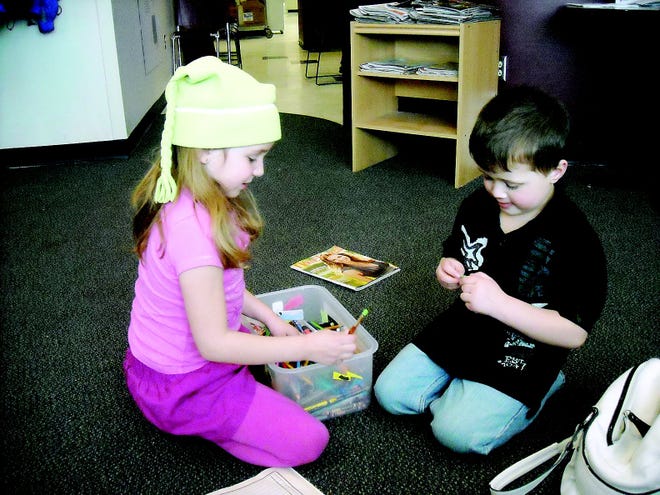 Eva Pardi, 6, plays with her friend Zach, on Jan. 15. The two have shared an immeasurable bond through Zach's battle with neuroblastoma.