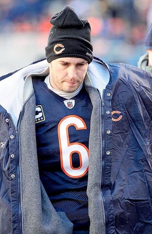 Chicago Bears quarterback Jay Cutler walks off the field just before the end of the first half of the NFC Championship game Sunday in Chicago. By CHARLES REX ARBOGAST, The Associated Press