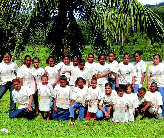 Children at a girl’s school in Belize posed for a group photo in their matching T-shirts from Greencastle, Pennsylvania, the home of Old Home Week.