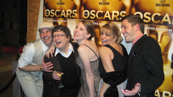Celebrating at last year's Oscar Night America were, from left, Jason Kakabaker, Tommy Allen, Kristin Revere, Kate Kowalk Moore and Peter Jacob.