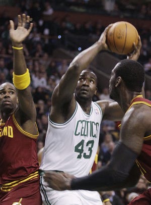 Celtics center Kendrick Perkins (43) looks to shoot against the Cavaliers last night in his first game back since suffering a torn knee ligament during last year's NBA Finals.