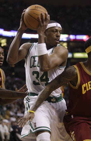 Celtics forward Paul Pierce looks for a way to the basket during the first quarter of Tuesday night's game against the Cavaliers.