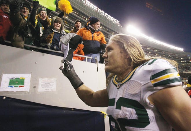 Green Bay Packers' Clay Matthews celebrates with fans after the NFC Championship NFL football game against the Chicago Bears Sunday, Jan. 23, in Chicago. The Packers won 21-14.