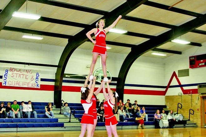 West Central cheerleaders perform during the Heat bowling team's sendoff.