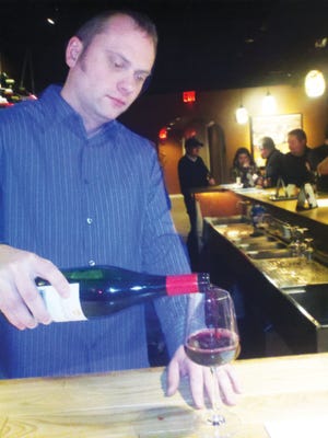 Paul Powers, general manger of the Vino Lounge, has years of experience in the wine industry.