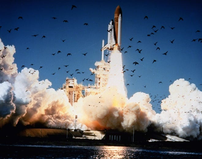 In this Jan. 28, 1986, file photo, the space shuttle Challenger lifts off Pad 39B at Kennedy Space Center, Florida. A whole generation has grown up since Christa McAuliffe and six other astronauts perished on live TV on Jan. 28, 1986, a quarter century ago. Now the former schoolchildren who loved McAuliffe are making sure that people who weren't even born then know about McAuliffe and her dream of going into space.
