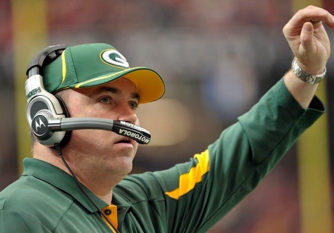 Green Bay Packers coach Mike McCarthy yells instructions in the first half of an NFL football game against the Atlanta Falcons at the Georgia Dome in Atlanta, Sunday, Nov. 28, 2010.