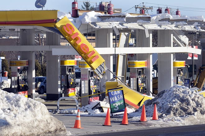 The canopy over the gas pumps at the Shell station at 466 Lincoln St. collapsed this morning under the weight of the snow.