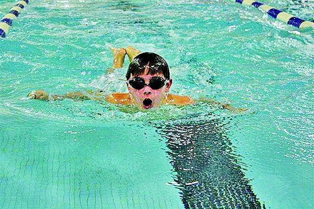 Riley Burgland swims the Butterfly at the Warren County YMCA